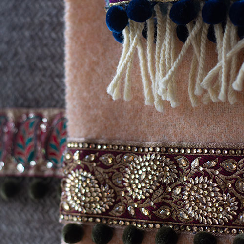 Luxury handmade Welsh blankets woven in small batches with hand stitched embellished borders