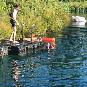 Wild swimming in  the lake at Beili Glas, Monmouthshire, Wales